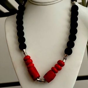 Beautiful handmade natural stone medium necklace. The red stone is coral.